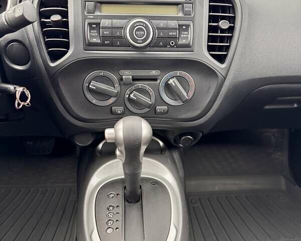 Червоний Ніссан Жук, об'ємом двигуна 1.6 л та пробігом 45 тис. км за 14500 $, фото 27 на Automoto.ua