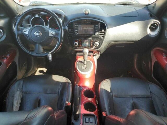 Червоний Ніссан Жук, об'ємом двигуна 1.6 л та пробігом 104 тис. км за 1000 $, фото 7 на Automoto.ua