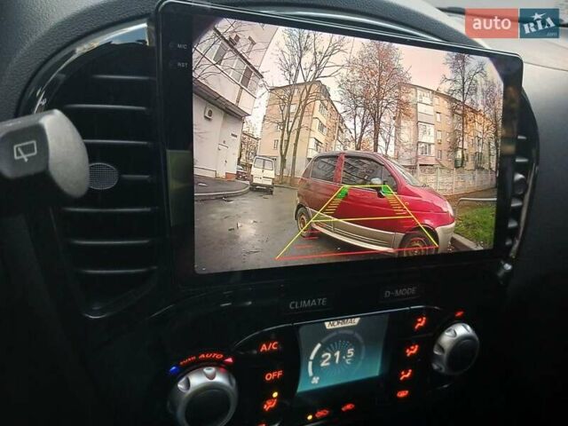 Червоний Ніссан Жук, об'ємом двигуна 1.6 л та пробігом 97 тис. км за 12900 $, фото 8 на Automoto.ua