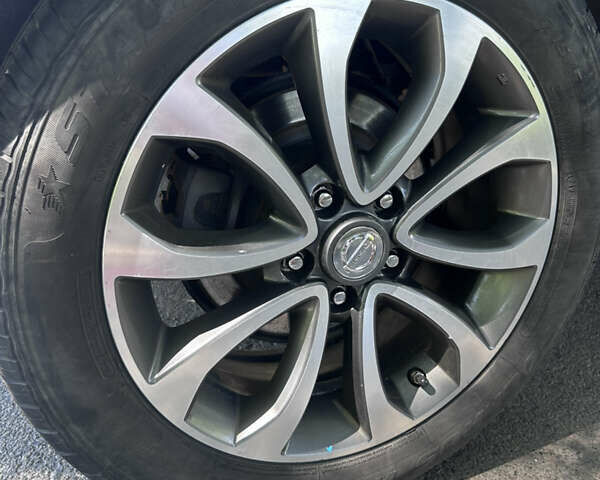 Красный Ниссан Жук, объемом двигателя 1.62 л и пробегом 76 тыс. км за 13333 $, фото 7 на Automoto.ua