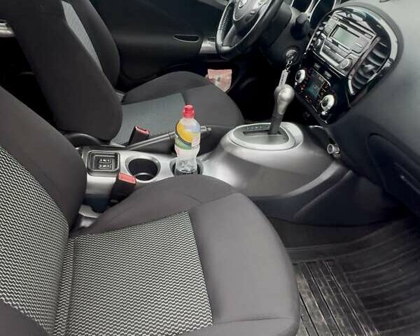 Червоний Ніссан Жук, об'ємом двигуна 1.6 л та пробігом 58 тис. км за 13000 $, фото 8 на Automoto.ua