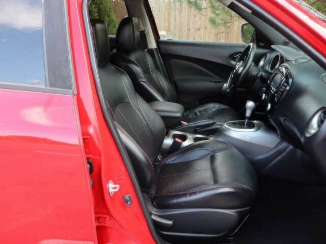 Красный Ниссан Жук, объемом двигателя 1.6 л и пробегом 72 тыс. км за 8000 $, фото 9 на Automoto.ua