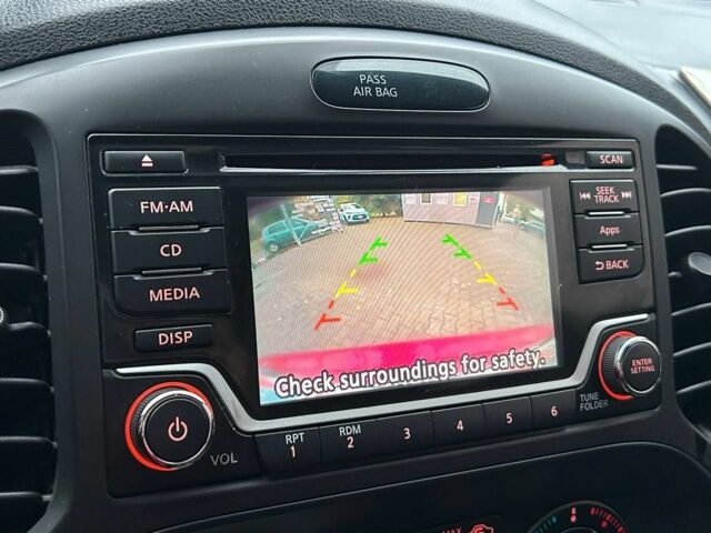 Красный Ниссан Жук, объемом двигателя 1.6 л и пробегом 118 тыс. км за 11900 $, фото 10 на Automoto.ua