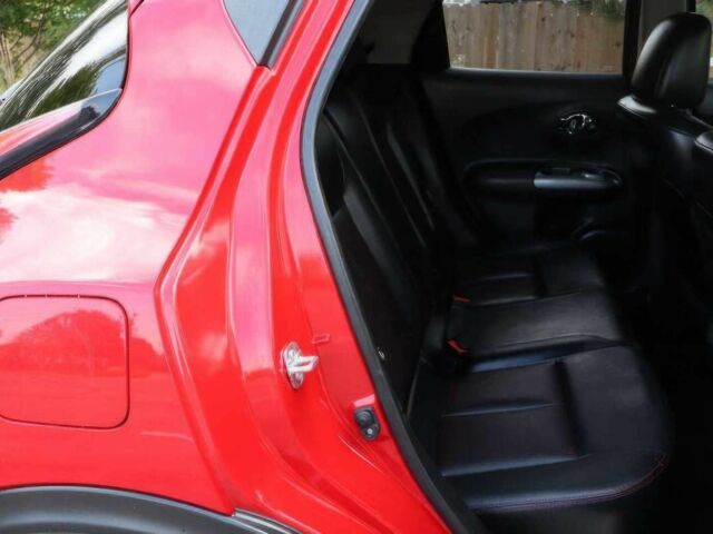 Красный Ниссан Жук, объемом двигателя 1.6 л и пробегом 72 тыс. км за 8000 $, фото 10 на Automoto.ua