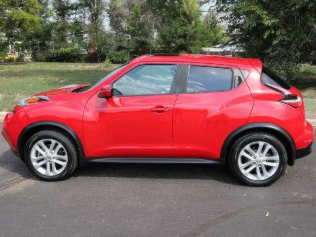 Красный Ниссан Жук, объемом двигателя 1.6 л и пробегом 72 тыс. км за 8000 $, фото 4 на Automoto.ua