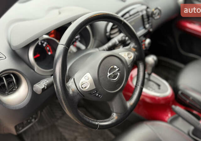 Красный Ниссан Жук, объемом двигателя 1.62 л и пробегом 80 тыс. км за 12680 $, фото 17 на Automoto.ua