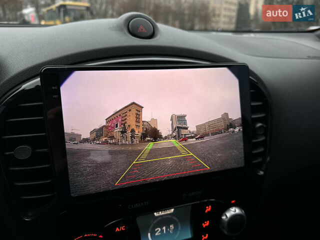 Червоний Ніссан Жук, об'ємом двигуна 1.6 л та пробігом 97 тис. км за 12300 $, фото 73 на Automoto.ua