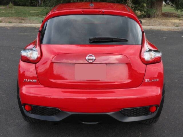 Красный Ниссан Жук, объемом двигателя 1.6 л и пробегом 72 тыс. км за 8000 $, фото 6 на Automoto.ua