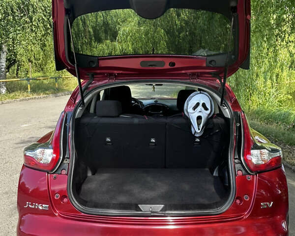 Красный Ниссан Жук, объемом двигателя 1.62 л и пробегом 76 тыс. км за 13333 $, фото 5 на Automoto.ua