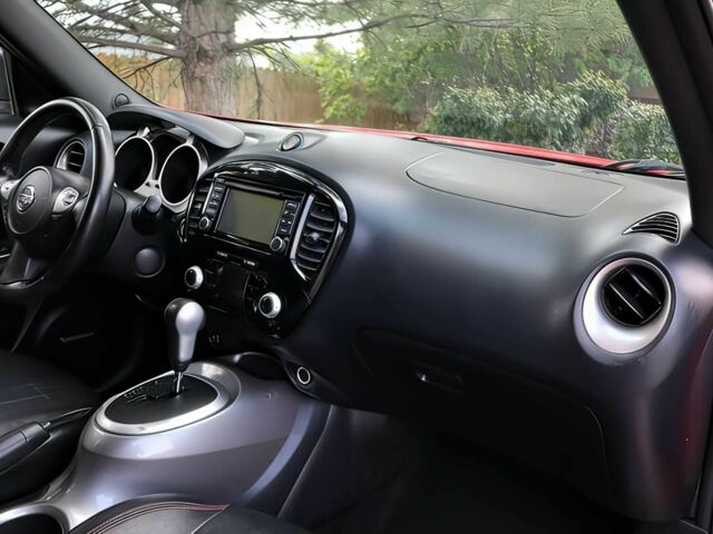 Красный Ниссан Жук, объемом двигателя 1.6 л и пробегом 78 тыс. км за 6000 $, фото 11 на Automoto.ua