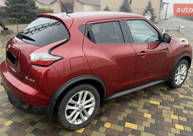 Красный Ниссан Жук, объемом двигателя 1.62 л и пробегом 80 тыс. км за 12680 $, фото 8 на Automoto.ua