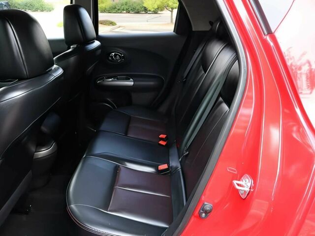 Красный Ниссан Жук, объемом двигателя 1.6 л и пробегом 78 тыс. км за 6000 $, фото 12 на Automoto.ua