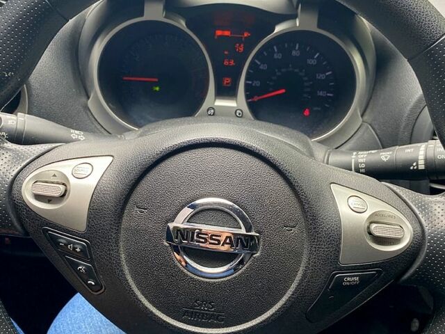 Красный Ниссан Жук, объемом двигателя 1.6 л и пробегом 110 тыс. км за 12700 $, фото 3 на Automoto.ua