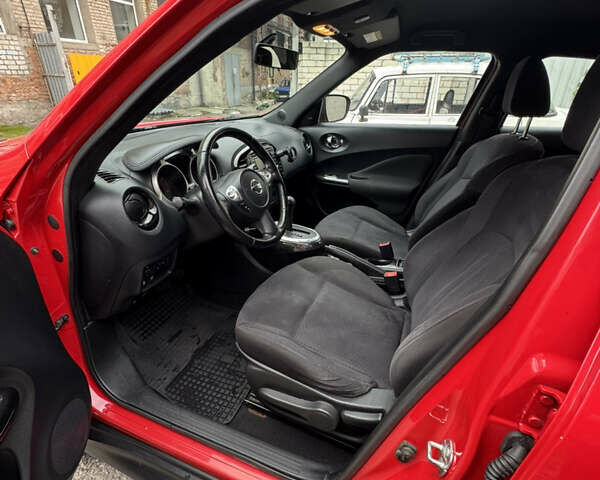 Червоний Ніссан Жук, об'ємом двигуна 1.6 л та пробігом 125 тис. км за 13500 $, фото 6 на Automoto.ua