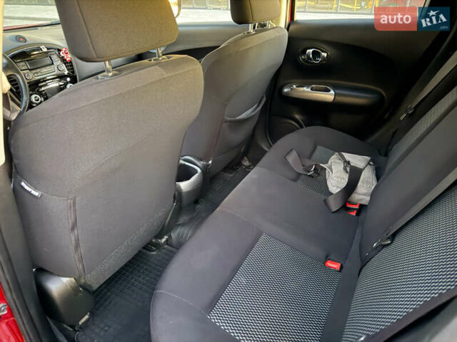 Червоний Ніссан Жук, об'ємом двигуна 1.6 л та пробігом 117 тис. км за 13750 $, фото 6 на Automoto.ua