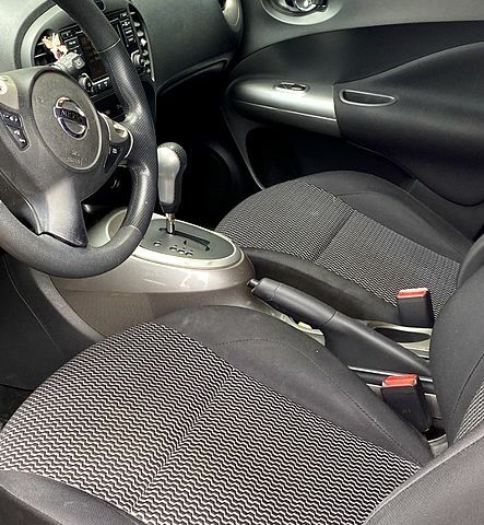 Красный Ниссан Жук, объемом двигателя 1.6 л и пробегом 110 тыс. км за 12700 $, фото 5 на Automoto.ua