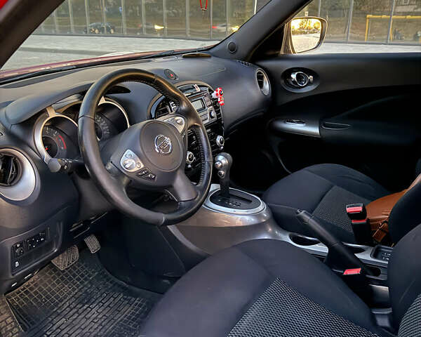 Червоний Ніссан Жук, об'ємом двигуна 1.6 л та пробігом 117 тис. км за 13750 $, фото 4 на Automoto.ua