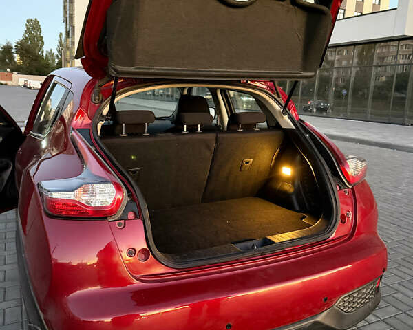 Червоний Ніссан Жук, об'ємом двигуна 1.6 л та пробігом 117 тис. км за 13750 $, фото 7 на Automoto.ua