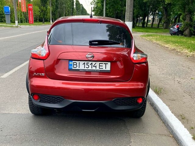 Красный Ниссан Жук, объемом двигателя 1.6 л и пробегом 110 тыс. км за 12700 $, фото 1 на Automoto.ua