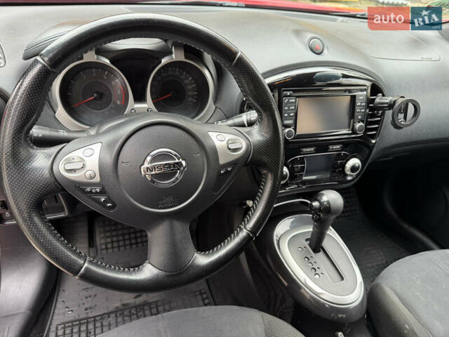 Червоний Ніссан Жук, об'ємом двигуна 1.6 л та пробігом 125 тис. км за 13500 $, фото 5 на Automoto.ua