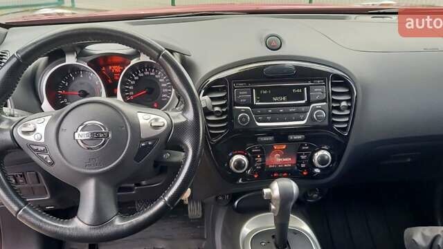 Червоний Ніссан Жук, об'ємом двигуна 1.6 л та пробігом 87 тис. км за 13499 $, фото 17 на Automoto.ua