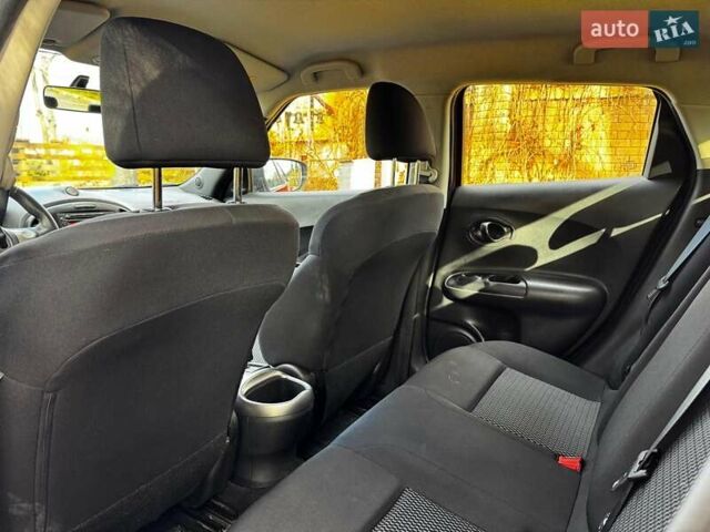 Червоний Ніссан Жук, об'ємом двигуна 1.6 л та пробігом 124 тис. км за 13490 $, фото 17 на Automoto.ua