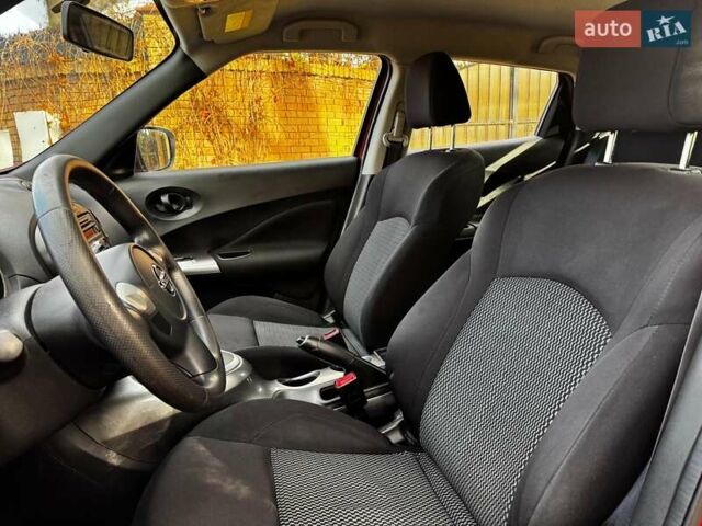 Червоний Ніссан Жук, об'ємом двигуна 1.6 л та пробігом 124 тис. км за 13490 $, фото 18 на Automoto.ua