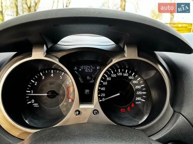 Червоний Ніссан Жук, об'ємом двигуна 1.6 л та пробігом 124 тис. км за 13490 $, фото 12 на Automoto.ua