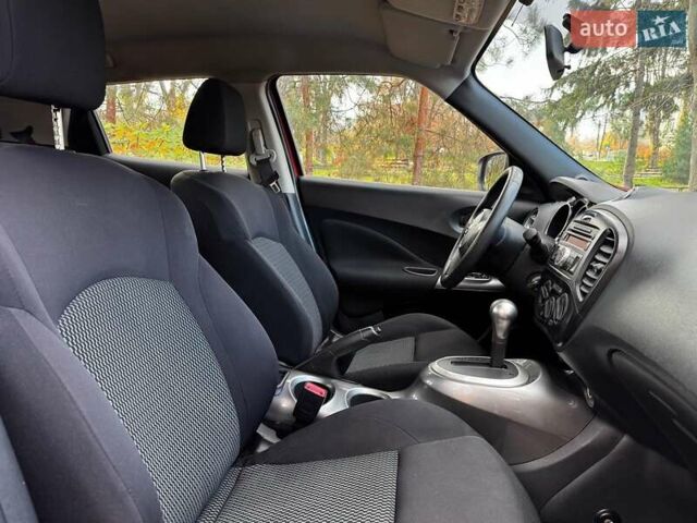 Червоний Ніссан Жук, об'ємом двигуна 1.6 л та пробігом 124 тис. км за 13490 $, фото 25 на Automoto.ua