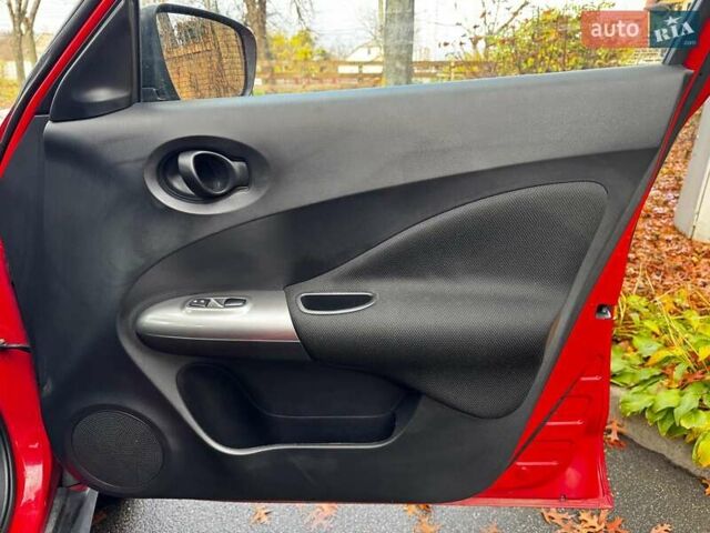 Червоний Ніссан Жук, об'ємом двигуна 1.6 л та пробігом 124 тис. км за 13490 $, фото 22 на Automoto.ua