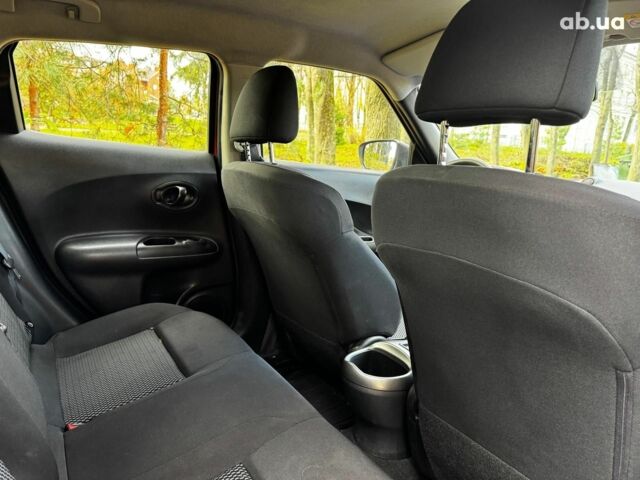 Красный Ниссан Жук, объемом двигателя 1.6 л и пробегом 124 тыс. км за 13490 $, фото 21 на Automoto.ua