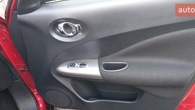 Червоний Ніссан Жук, об'ємом двигуна 1.6 л та пробігом 87 тис. км за 13499 $, фото 7 на Automoto.ua