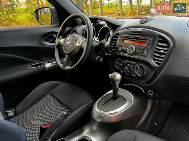 Червоний Ніссан Жук, об'ємом двигуна 1.6 л та пробігом 124 тис. км за 13490 $, фото 24 на Automoto.ua