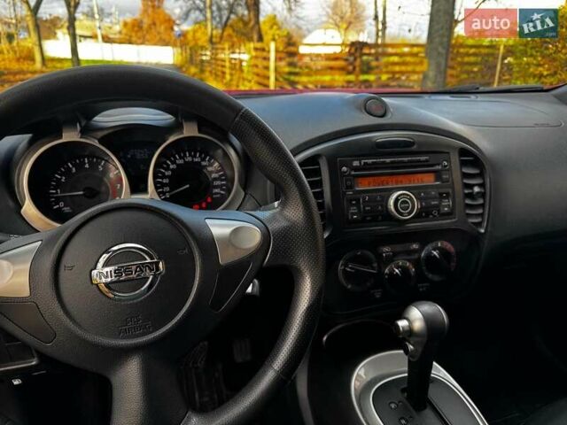 Червоний Ніссан Жук, об'ємом двигуна 1.6 л та пробігом 124 тис. км за 13490 $, фото 15 на Automoto.ua