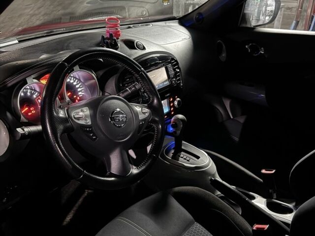 Червоний Ніссан Жук, об'ємом двигуна 1.6 л та пробігом 114 тис. км за 14000 $, фото 7 на Automoto.ua