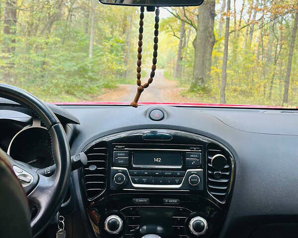 Красный Ниссан Жук, объемом двигателя 1.6 л и пробегом 25 тыс. км за 18000 $, фото 8 на Automoto.ua