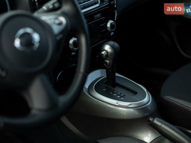 Червоний Ніссан Жук, об'ємом двигуна 1.6 л та пробігом 52 тис. км за 14400 $, фото 10 на Automoto.ua