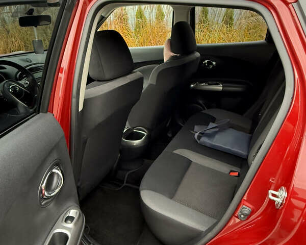 Червоний Ніссан Жук, об'ємом двигуна 1.6 л та пробігом 55 тис. км за 15000 $, фото 11 на Automoto.ua