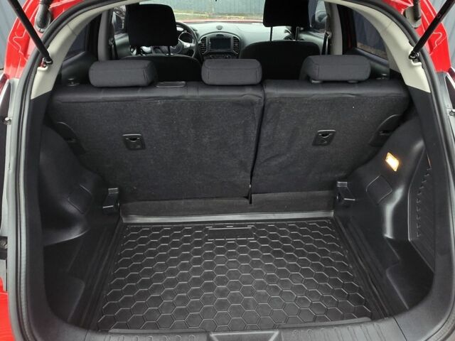 Красный Ниссан Жук, объемом двигателя 1.6 л и пробегом 46 тыс. км за 12500 $, фото 7 на Automoto.ua