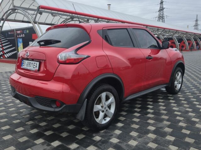 Красный Ниссан Жук, объемом двигателя 1.6 л и пробегом 46 тыс. км за 12500 $, фото 1 на Automoto.ua