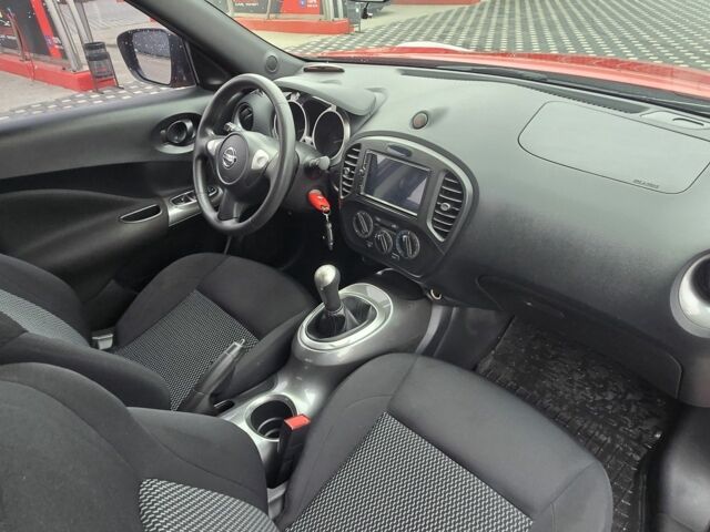 Красный Ниссан Жук, объемом двигателя 1.6 л и пробегом 46 тыс. км за 12500 $, фото 6 на Automoto.ua