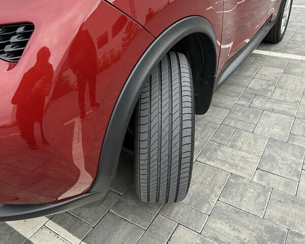 Червоний Ніссан Жук, об'ємом двигуна 1.6 л та пробігом 55 тис. км за 15000 $, фото 14 на Automoto.ua