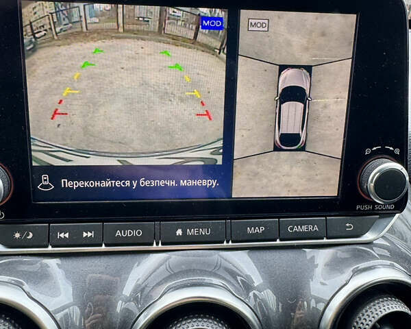 Красный Ниссан Жук, объемом двигателя 1 л и пробегом 49 тыс. км за 20000 $, фото 20 на Automoto.ua