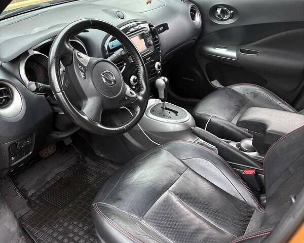 Желтый Ниссан Жук, объемом двигателя 1.6 л и пробегом 168 тыс. км за 9700 $, фото 3 на Automoto.ua