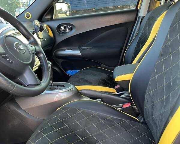 Желтый Ниссан Жук, объемом двигателя 1.6 л и пробегом 130 тыс. км за 9500 $, фото 6 на Automoto.ua