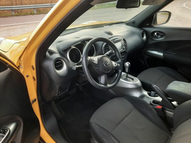 Желтый Ниссан Жук, объемом двигателя 1.6 л и пробегом 125 тыс. км за 9700 $, фото 6 на Automoto.ua