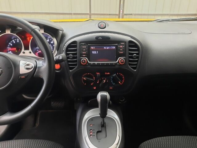 Желтый Ниссан Жук, объемом двигателя 1.6 л и пробегом 125 тыс. км за 9700 $, фото 18 на Automoto.ua