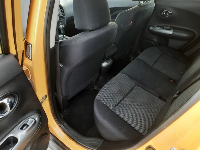 Желтый Ниссан Жук, объемом двигателя 1.6 л и пробегом 125 тыс. км за 9700 $, фото 7 на Automoto.ua