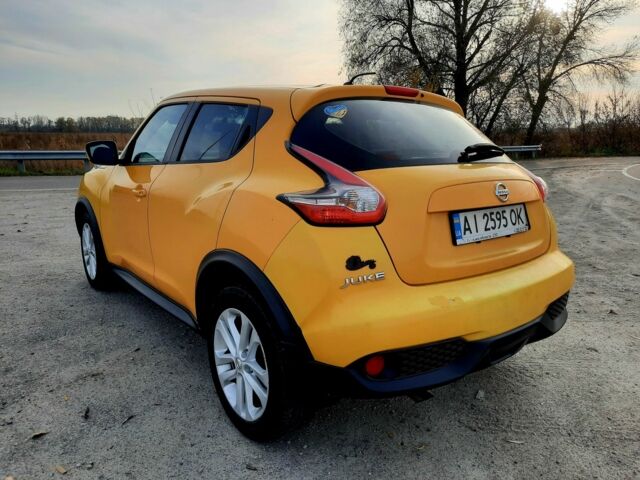 Желтый Ниссан Жук, объемом двигателя 1.6 л и пробегом 125 тыс. км за 9700 $, фото 5 на Automoto.ua