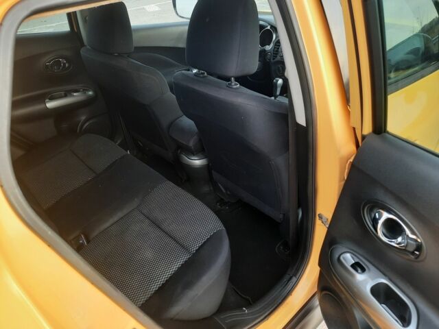 Желтый Ниссан Жук, объемом двигателя 1.6 л и пробегом 125 тыс. км за 9700 $, фото 8 на Automoto.ua